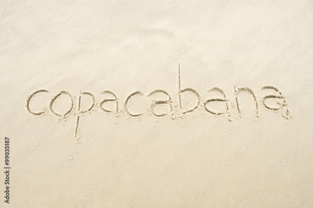 Copacabana, the famous beach, message handwritten on smooth sand in Rio de Janeiro, Brazil Copacabana, the famous beach, message handwritten on smooth sand in Rio de Janeiro, Brazil
