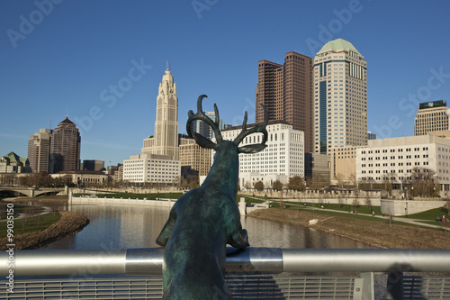 COLUMBUS, OHIO - OCTOBER 25, 2015: The iconic deer statue stands on the Rich Street Bridge gazing at the city of Columbus.