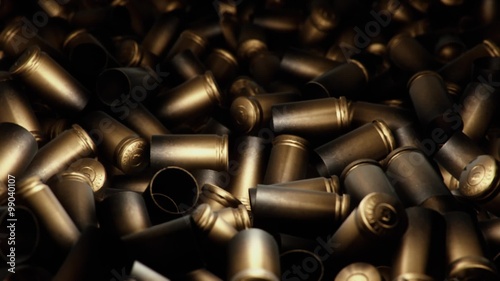 An endless ocean of spent pistol casings.