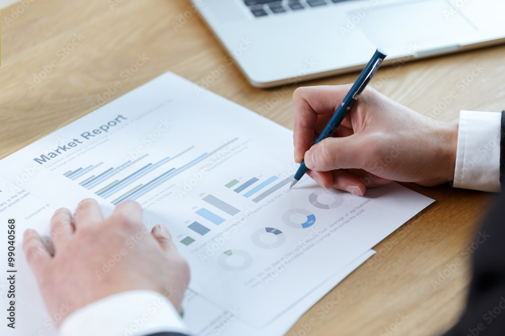 businessman checking financial reports businessman checking financial reports