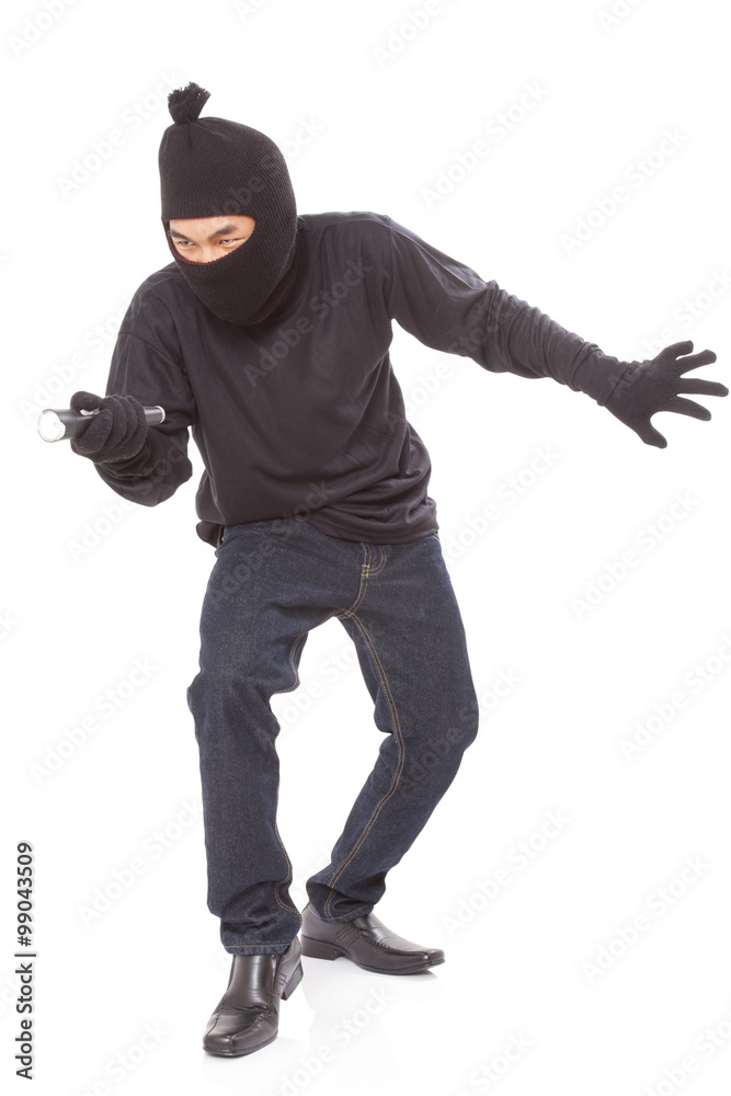 Thief holding flashlight on white background Thief holding flashlight on white background