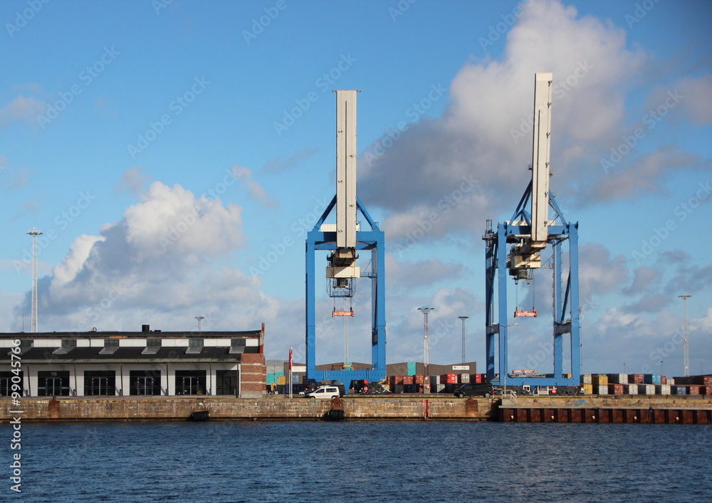 Container Cranes at Harbor Pier with Water Front