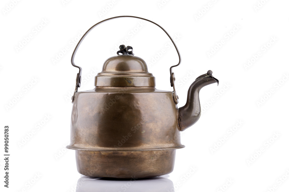 old antique copper kettle isolated on a white background