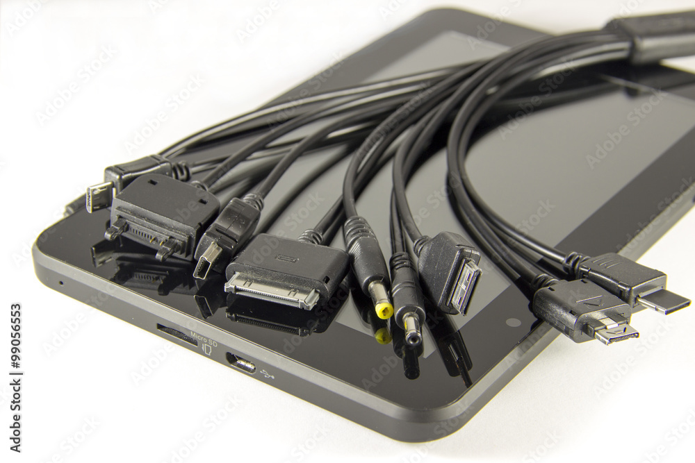 Tablet computer with a lot of cables Tablet computer with a lot of cables