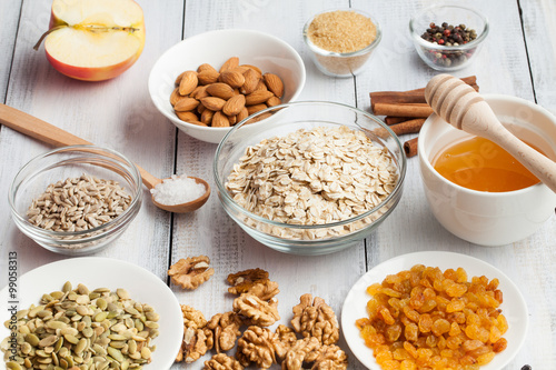 Grain free oat free paleo granola: mixed nuts, seeds, raisins, h © igorp17