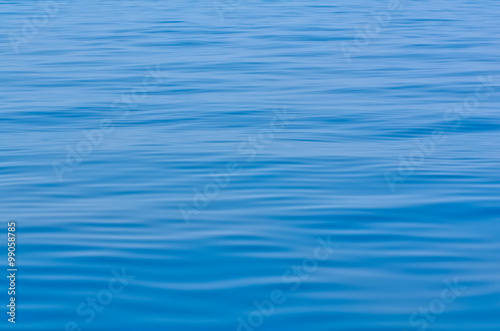 Fototapeta Naklejka Na Ścianę i Meble -  Serene blue ocean waves calm before storm