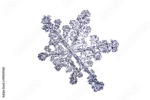 natural snowflake isolated on a white closeup