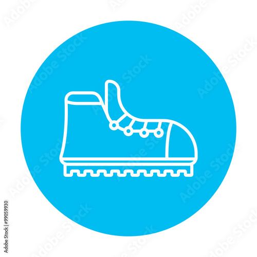 Hiking boot with crampons line icon.