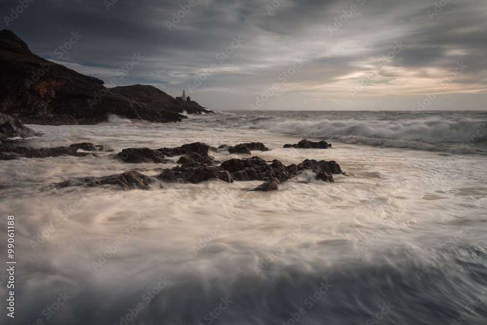Sea foam covered Bracelet Bay on the Gower peninsula, Swansea Sea foam covered Bracelet Bay on the Gower peninsula, Swansea