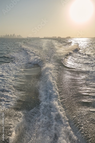 Boat wake, trail in sea after fast moving 