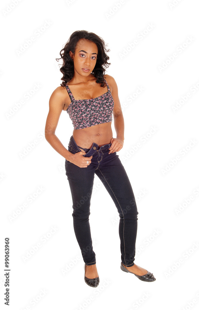 African American woman standing in full light. African American woman standing in full light.
