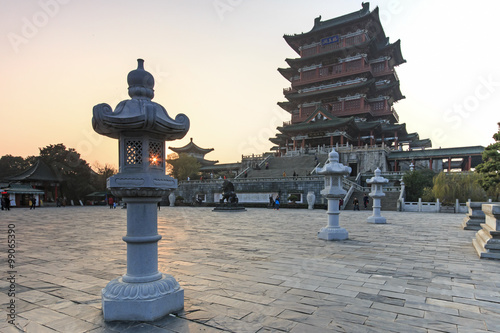 Nanchang, China - December 30, 2015: Tengwang Pavilion in Nanchang at sunset with many tourists visiting the place photo