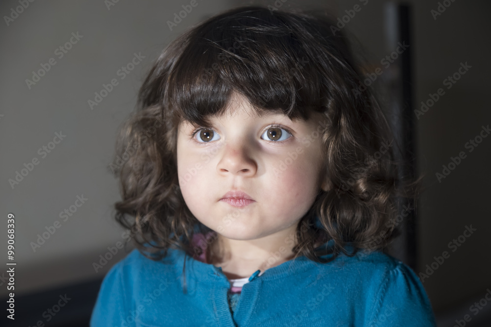 Portrait of Small girl at dark with sparkling eyes Portrait of Small girl at dark with sparkling eyes