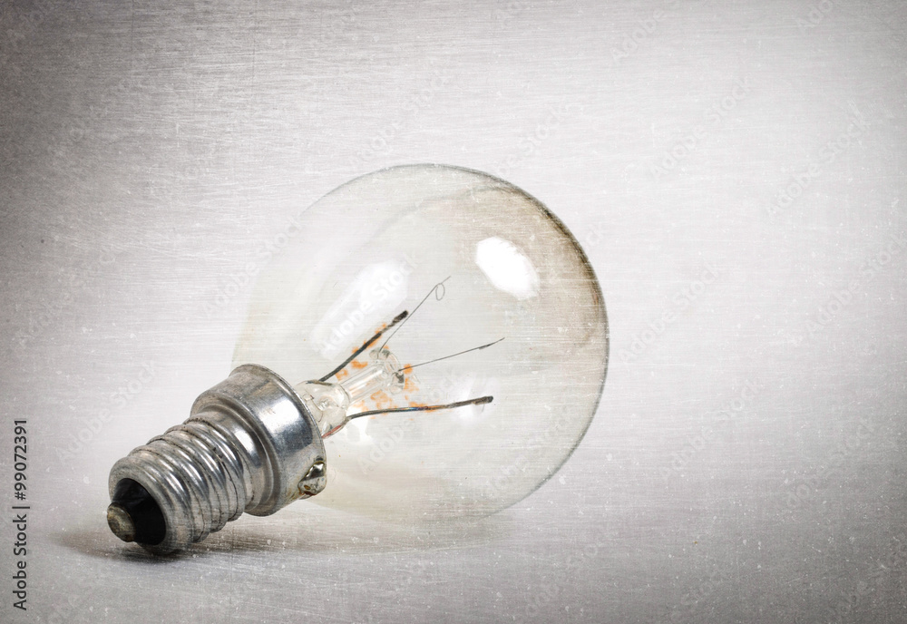 Old lightbulb isolated on a white background Old lightbulb isolated on a white background
