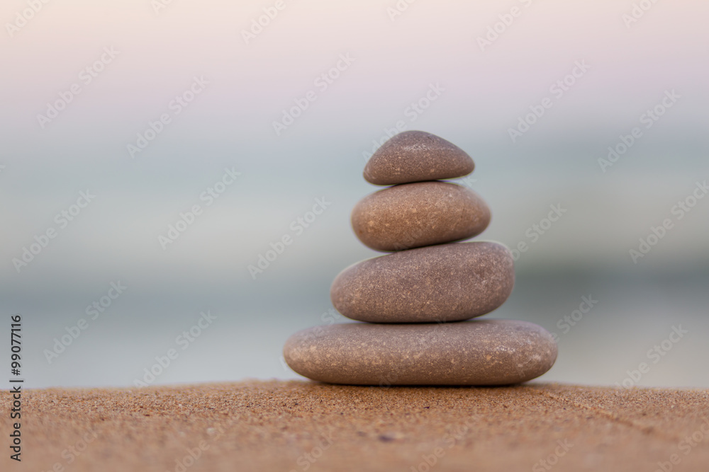 Stacked Zen stones on the beach