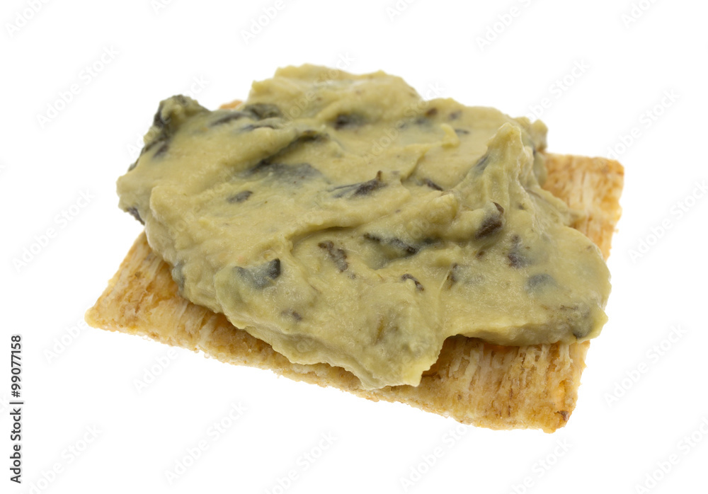 Spinach hommus on whole grain cracker Spinach hommus on whole grain cracker