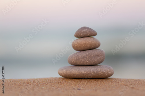 Stacked Zen stones on the beach