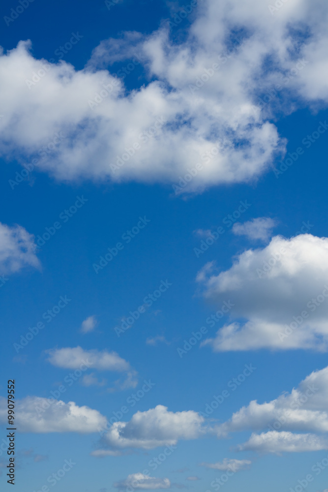 Cloudscape over horizon. Blue sky and white clouds. Cloudscape over horizon. Blue sky and white clouds.