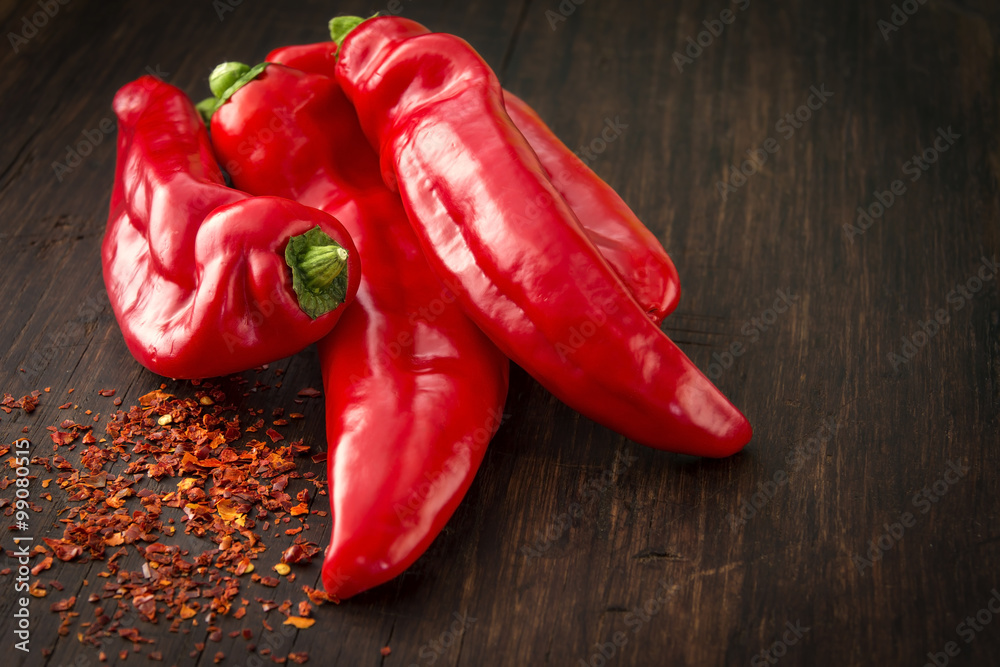 Four fresh red sweet (paprika) peppers