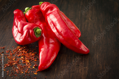 Obraz na płótnie Four fresh red sweet (paprika) peppers w salonie
