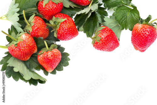 Fresh Strawberries with leaf isolated on white background.
