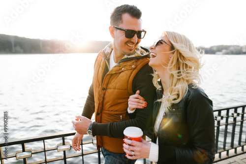 Happy In love couple smiling and hugging eachother outdoor 