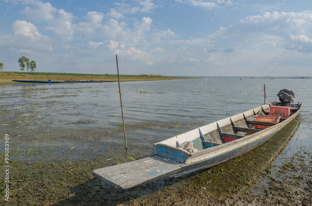 Obraz premium Fishing boats of the locals,Fishing boats moored at the river's