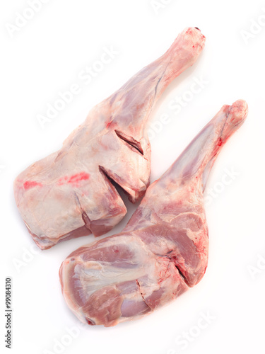 raw lamb shoulders on white background