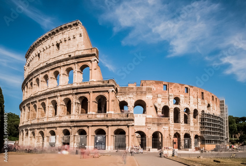 Closeup of the mighty Colosseum in Rome, Italy on a sunny summer day with blue sky.
