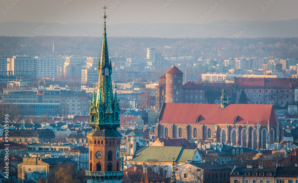 Naklejka premium Panoramic view of Royal Wawel Castle in Krakow and St. Joseph's Church, view from Krakus Mound