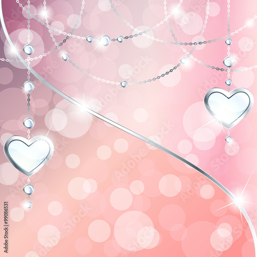 Sparkly peach pink background with silver heart-shaped pendants