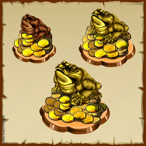 Three frog figurines sitting on gold, FengShui talisman