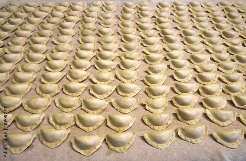 Obraz premium Polish dumplings on a canvas background.