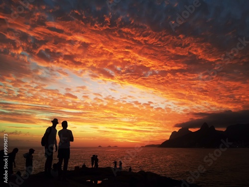 Amazing red sunset at Arpoador Rio de Janeiro photo