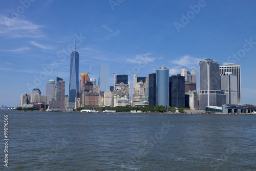 Lower Manhattan in New York City in the background. The new World Trade Center Freedom Tower as seen Summer 2015 