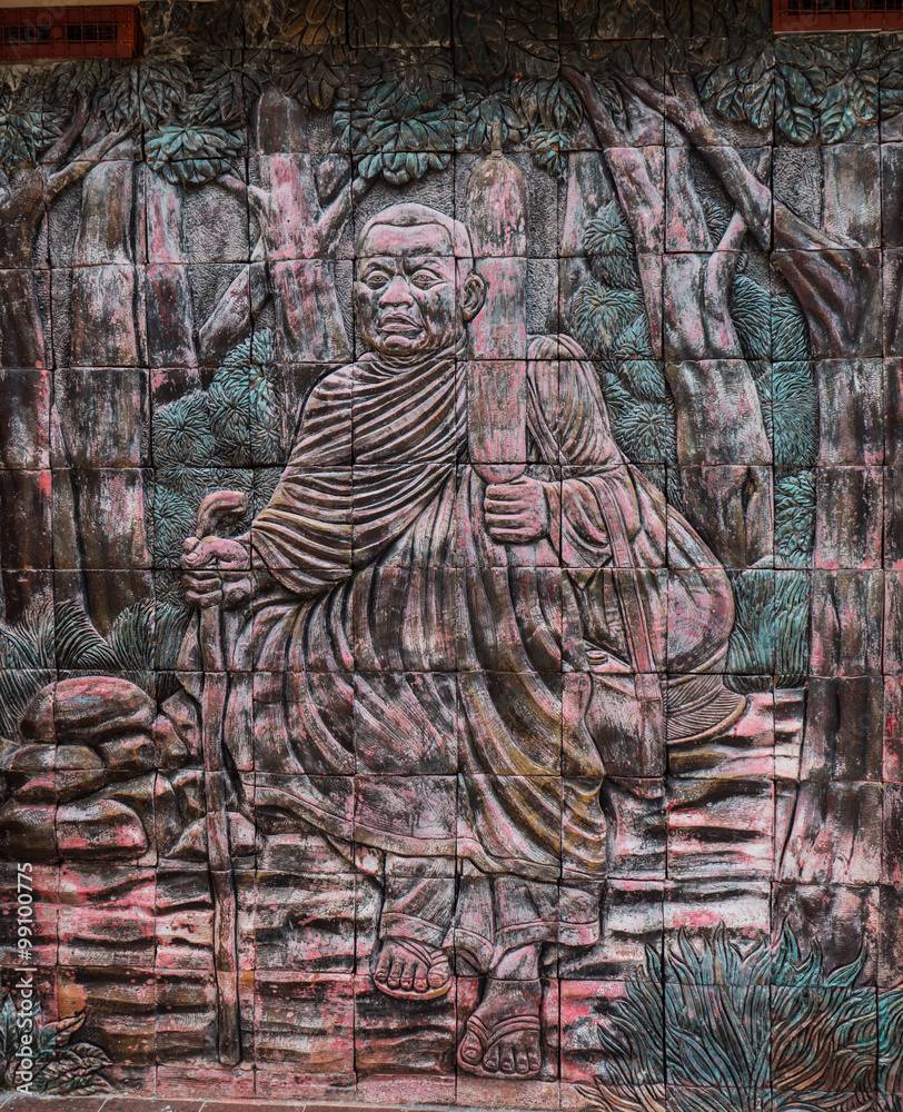 Naklejka premium Art of Buddhist monk on wall