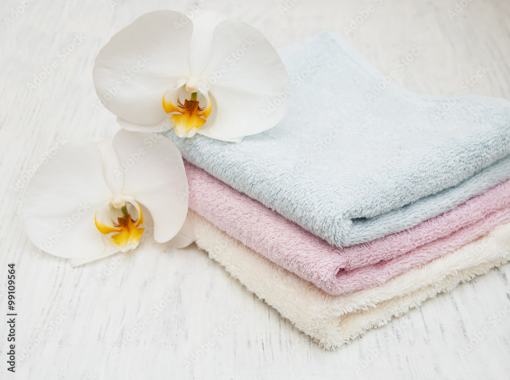 Orchids and spa towels