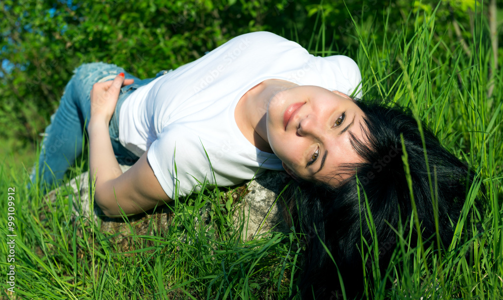 The beautiful woman lying on stone The beautiful woman lying on stone