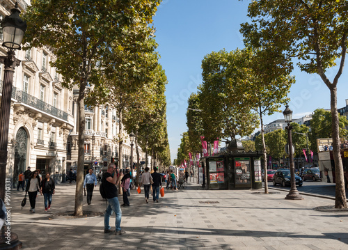 Vászonkép The Champs-Elysees the most famous avenue of Paris and is full of stores, cafes and restaurants