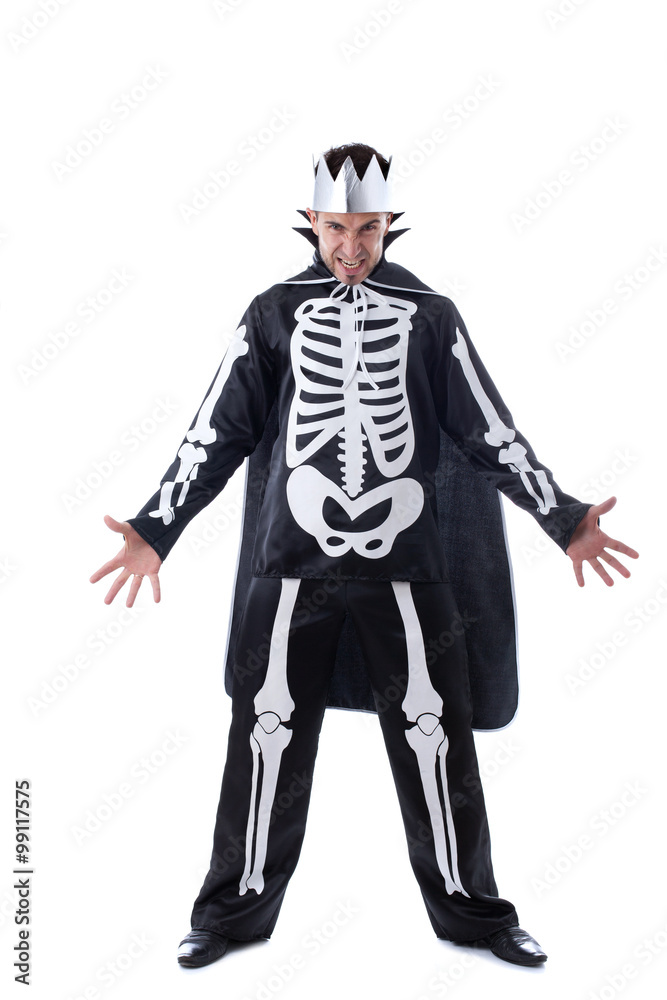 Evil man posing dressed as King of skeletons