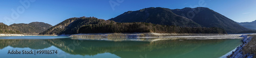 Restliches Wasser im abgelassenen Sylvensteinspeicher in den Alpen photo