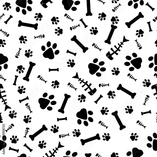 monochrome pattern of footprints, bones and fish