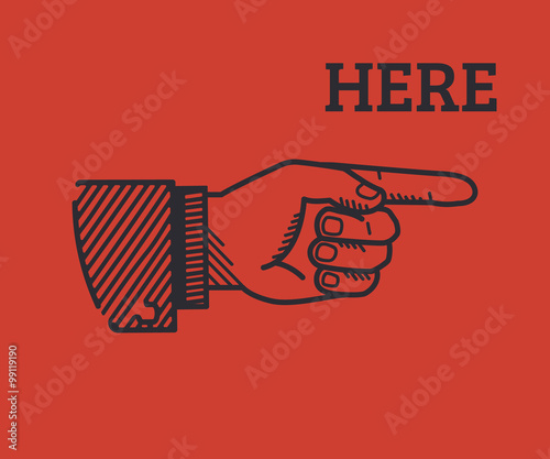 Human finger with sign here