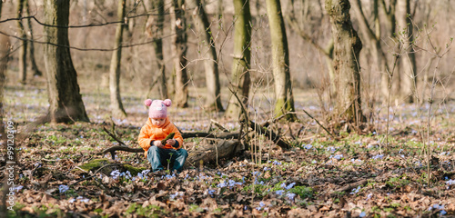 baby girl in the woods