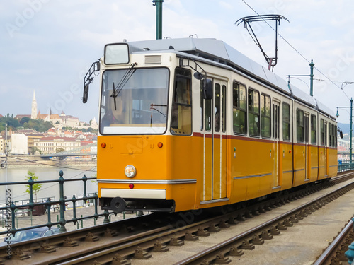Historic yellow tram on the street, Budapest, Hungary © Arndale