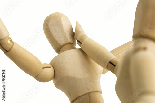 wooden figure abuse hitting concept