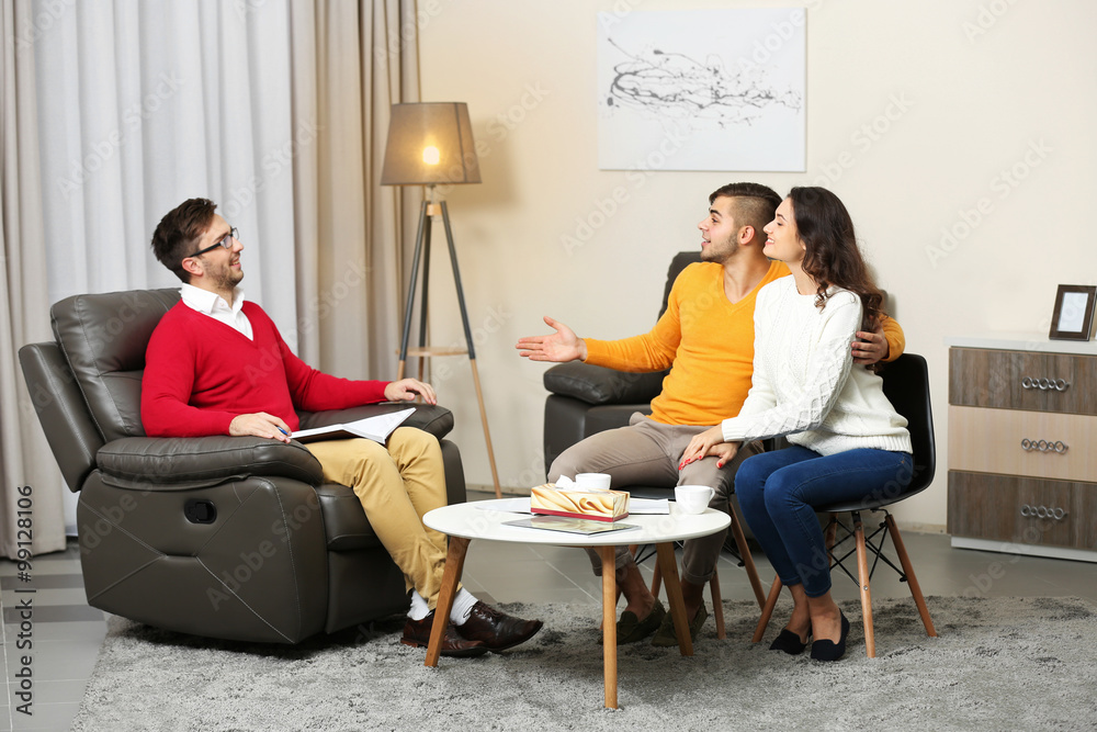 Young happy couple after therapy session with family psychologist Young happy couple after therapy session with family psychologist