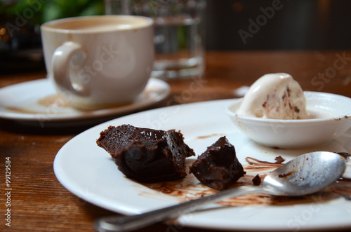 Chocolate cake and ice cream with a cup of coffee