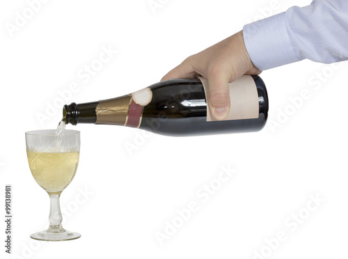 Man's hand (waiter) is poured champagne in crystal glass
