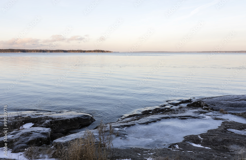 Unfrozen lake just before ice is going to cover it Unfrozen lake just before ice is going to cover it